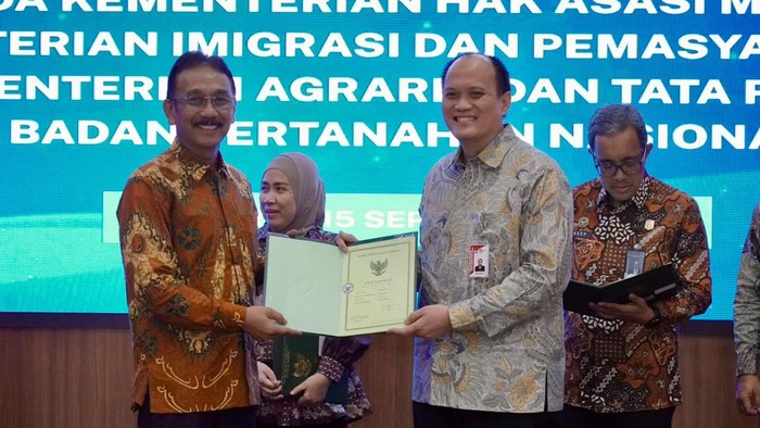 Sekjen ATR/BNP Dalu Agung Darmawan dan Direktur Labuksi KPK Mungki Hadipratikto.