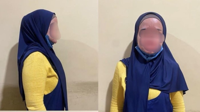 Wanita yang aniaya balita di Palembang saat diamankan polisi