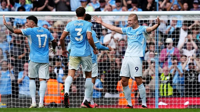 Manchester Citys Erling Haaland (right) celebrates scoring their sides fifth goal of the game after a VAR check during the Premier League match at the Etihad Stadium, Manchester. Picture date: Sunday September 20, 2026. (Photo by Martin Rickett/PA 