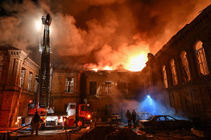 Firefighters work at the site of a shopping mall hit by an overnight Russian drone strike, amid Russias attack on Ukraine, in Zaporizhzhia, Ukraine September 21, 2026. REUTERS/Stringer