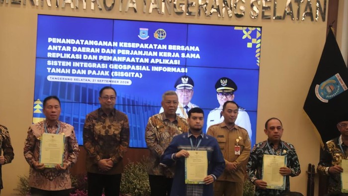 Penandatanganan Kesepakatan Bersama Antar Daerah serta Perjanjian Kerja Sama Replikasi dan Pemanfaatan Aplikasi Sistem Integrasi Geospasial Informasi Tanah dan Pajak (SIGITA) di Tangerang Selatan.