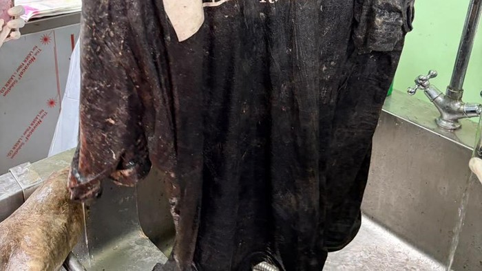 Baju yang diduga dikenakan Denny Dwi Saputra.