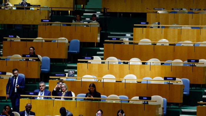 Delegates from Greece attend Israels Prime Minister Benjamin Netanyahus address during the 81st United Nations General Assembly, in front of empty seats of the Iranian and other delegations, at UN headquarters in New York City, US, September 24, 20