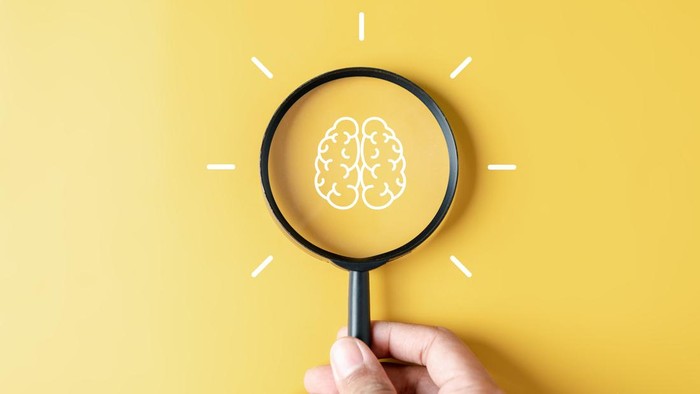 Magnifier with Brainstorm inside to smart, idea, creative, thinking;, education, innovation smart intelligence concept.