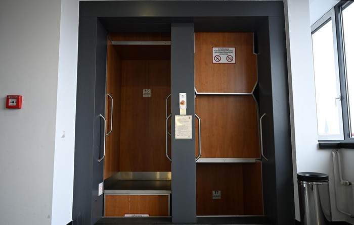 PRODUCTION - 18 August 2026, Hesse, Frankfurt am Main: The paternoster elevator at the Frankfurt Higher Regional Court is one of the few continuous-circulation elevators in Hesse. In a paternoster elevator, the cabins are constantly moving. Photo: Lea Winkler/dpa (Photo by Lea Winkler/picture alliance via Getty Images)