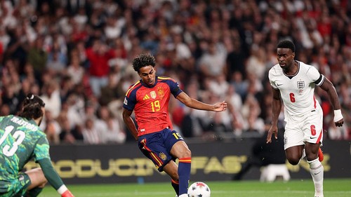 LONDON, ENGLAND - SEPTEMBER 26: Lamine Yamal of Spain scores his teams first goal under pressure from Marc Guehi of England during the UEFA Nations League 2026/27 group phase match between England and Spain at Wembley Stadium on September 26, 2026 in London, England. (Photo by Carl Recine/Getty Images)