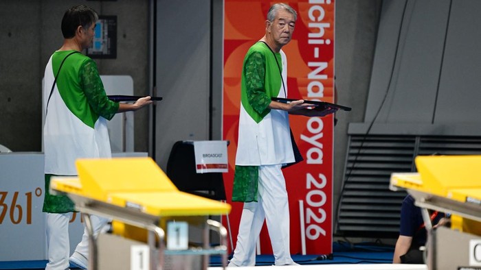 TOKYO, JAPAN - SEPTEMBER 23: Senior etiquette volunteers work in the swimming event on day four of the 20th Asian Games Aichi-Nagoya at Tokyo Aquatics Centre on September 23, 2026 in Tokyo, Japan. (Photo by Cui Nan/China News Service/VCG via Getty Im