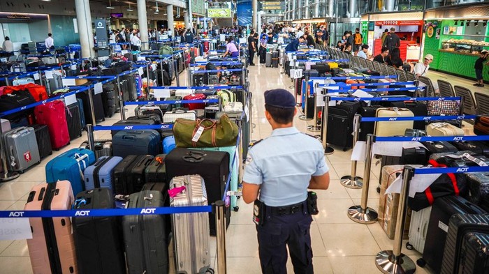 Baggage from Thai Airways flights at Suvarnabhumi International Airport, after heavy rain and flooding disrupted the airlines ground operations, in Bangkok, Thailand, September 29, 2026. REUTERS/Athit Perawongmetha