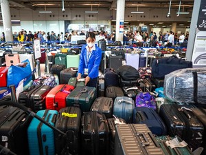 Thai Airways Gratiskan Ongkir Koper Penumpang Korban Banjir Thailand
