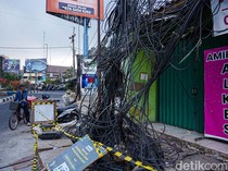 Kabel Semrawut Menjuntai di Ciledug, Kini Dipasang Garis Pengaman