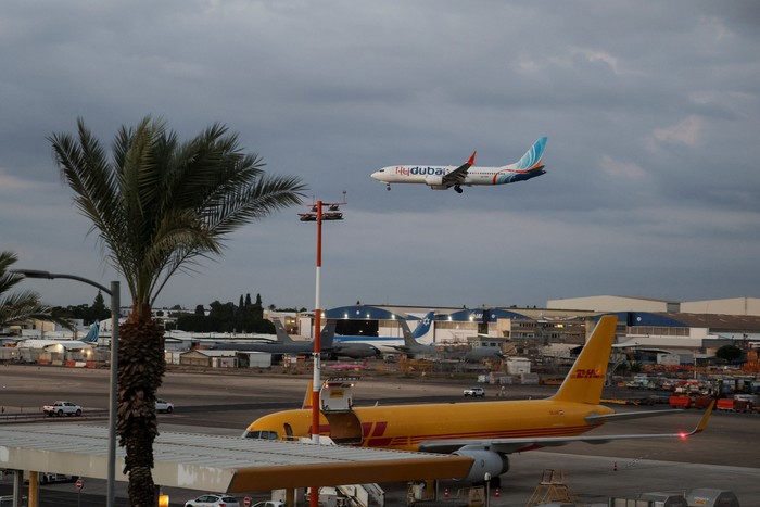 A plane, carrying passengers who were on the FlyDubai aircraft bound for Israel from the United Arab Emirates, which was diverted to Saudi Arabia following an emergency signal, arrives at the Ben Gurion International Airport, in Lod, near Tel Aviv, I
