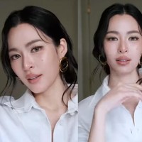 Detail anting emas melingkar dan makeup natural menyempurnakan penampilan Lingling Kwong yang elegan. Foto: Dok. Instagram Lingling Kwong, Orm Kornnaphat