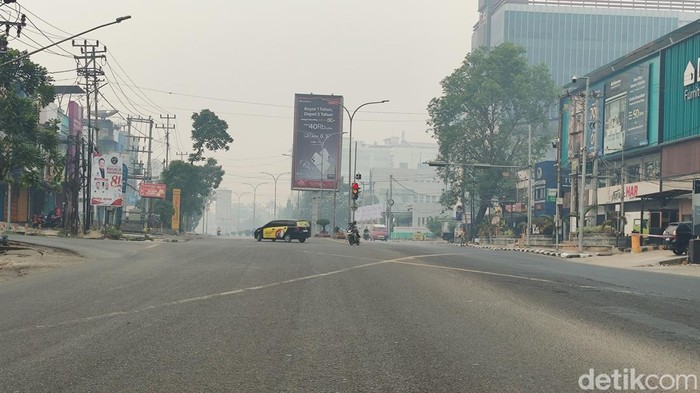 Kota Palembang diselimuti kabut asap