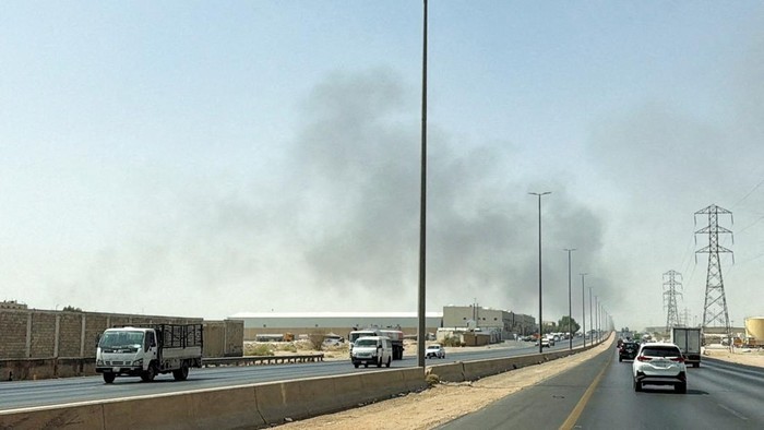 Smoke rises from a fire at the Aramco refinery south of Riyadh, Saudi Arabia, October 3, 2026. Picture taken with a mobile phone. REUTERS/Stringer
