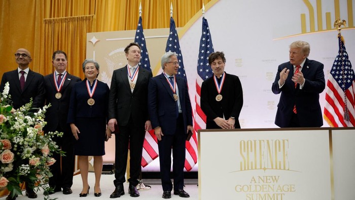 (From L) Microsoft CEO Satya Nadella, Dell Techologies CEO Michael Dell, AMD CEO Lisa Su, SpaceX CEO Elon Musk, Nvidia CEO Jensen Huang and entrepreneur Sergey Brin are applauded by US President Donald Trump during the 