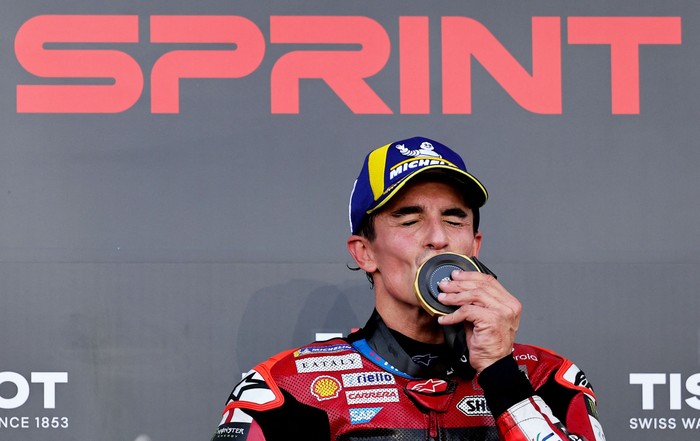 MotoGP - Indonesian Grand Prix - Mandalika International Street Circuit, Mandalika, Indonesia - October 10, 2026 Ducati Lenovo Teams Marc Marquez celebrates on the podium after winning the sprint race REUTERS/Willy Kurniawan