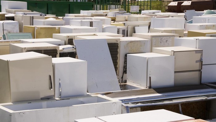 Rows of discarded fridges at the dump.
