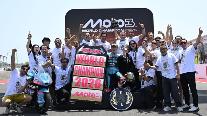LOMBOK, INDONESIA - OCTOBER 11: Race winner and world champion Maximo Quiles of Spain riding the CFMOTO Viel Aspar bike celebrates with his team during the Moto3 Race on October 11, 2026 in Lombok, Indonesia. (Photo by Gold & Goose Photography/Getty 