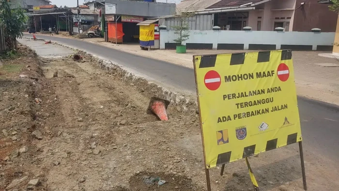 Perbaikan Jalan Raya Tapos