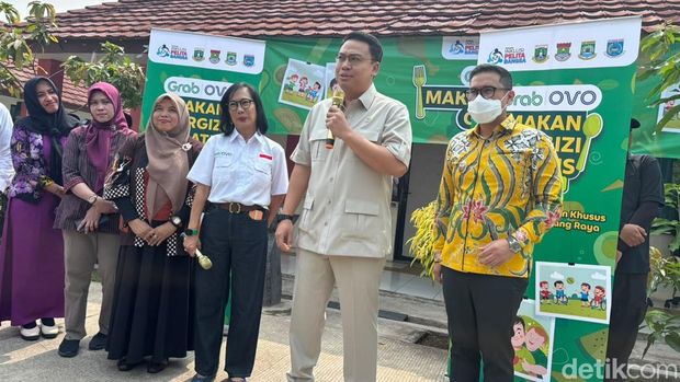 Program Makan Bergizi Gratis Program Makan Bergizi Gratis (MBG) yang memanfaatkan teknologi dari Grab dan Ovo.