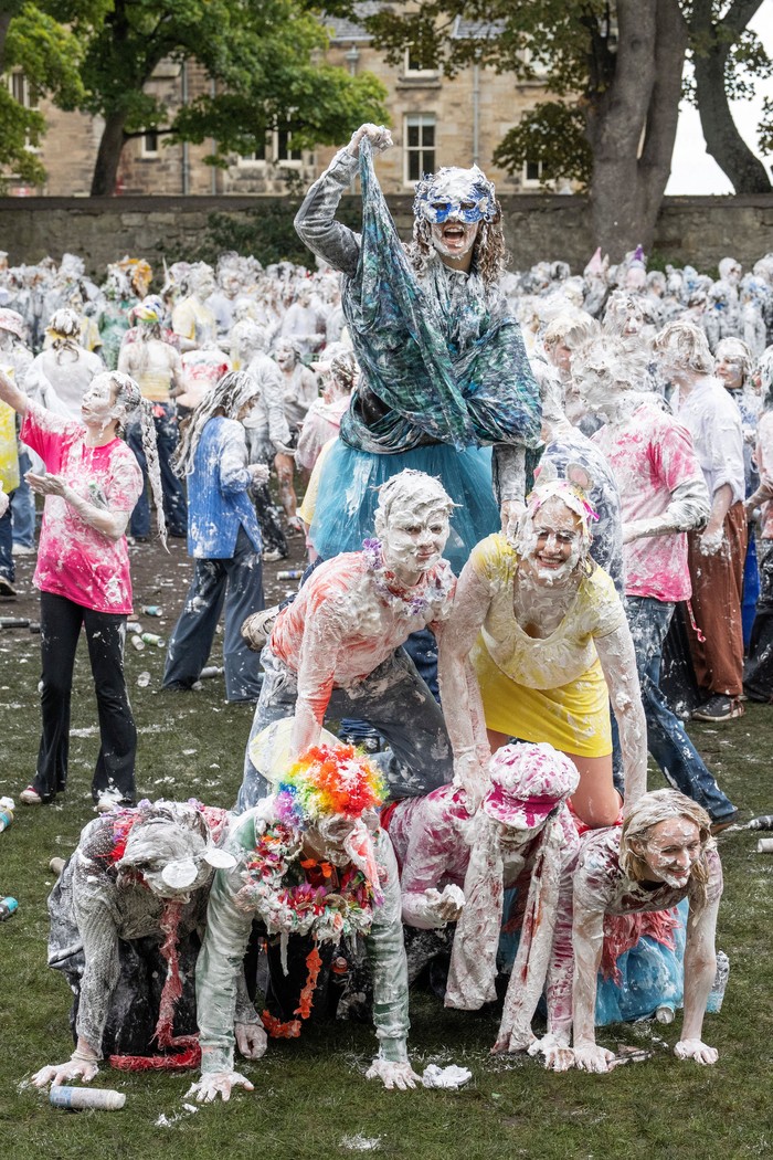 Students from St Andrews take part in a foam fight, as part of 