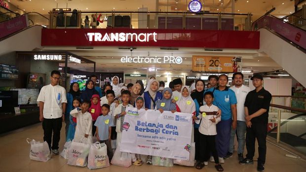 30 Anak yatim berbelanja di TransMart