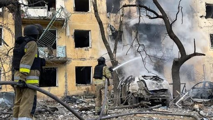 In this handout photograph taken and released by the Ukrainian Emergency Service on October 20, 2026, Ukrainian rescuers work to extinguish a fire at the site of an air attack in Kramatorsk, Donetsk region, amid the Russian invasion of Ukraine. Three