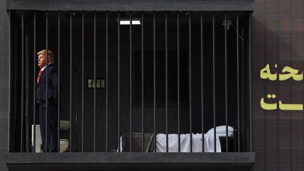 A person dressed up as US President Donald Trump inside a mock prison cell during a performance in Tehran, Iran, October 21, 2026. Majid Asgaripour/WANA (West Asia News Agency) via REUTERS ATTENTION EDITORS - THIS PICTURE WAS PROVIDED BY A THIRD PARTY. ISRAEL OUT. NO COMMERCIAL OR EDITORIAL SALES IN ISRAEL. NO ACCESS FOR ISRAELI MEDIA. NO USE BBC PERSIAN. NO USE VOA PERSIAN. NO USE MANOTO. NO USE IRAN INTERNATIONAL. NO USE RADIO FARDA. DIGITAL: NO USE BBC PERSIAN. NO USE VOA PERSIAN. NO USE MANOTO. NO USE IRAN INTERNATIONAL. NO USE RADIO FARDA.