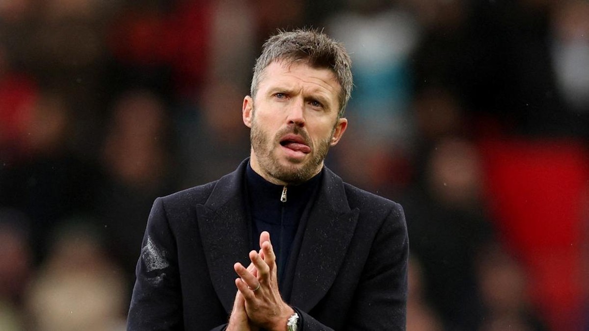 Manchester United harus keluar Rp 212 miliar jika mau pecat Michael Carrick. (REUTERS/Chris Radburn)
