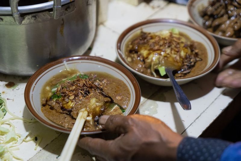 mie ongklok or ongklok noodles served with beef satay, traditional noodles food from Wonosobo, indonesia