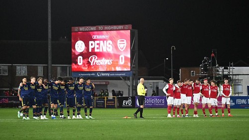 FLEETWOOD, ENGLAND - OCTOBER 27: Arsenal and Fleetwood Town players line up during the penalty shootout during the Carabao Cup Fourth Round match between Fleetwood Town and Arsenal at Highbury Stadium on October 27, 2026 in Fleetwood, England. (Photo by Stuart MacFarlane/Arsenal FC via Getty Images)