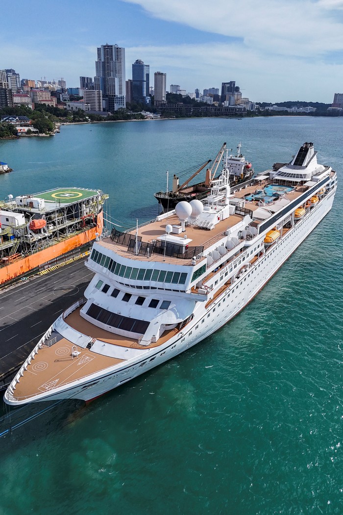 A drone view of the Villa Vie Odyssey cruise ship docking at Sihanoukville Autonomous Port, after permanent residents living aboard the vessel were forced to disembark in Cambodia, as the operator said rising fuel prices linked to conflict involving Iran had made operations prohibitively expensive, in Preah Sihanouk province, Cambodia, October 29, 2026. REUTERS/Soveit Yarn
