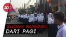 Puluhan Siswa Kecewa Tak Bisa Lihat Pawai Obor Asian Games Puluhan Siswa Kecewa Tak Bisa Lihat Pawai Obor Asian Games