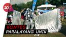 Karnaval Paralayang Unik di Pegunungan Alpen Karnaval Paralayang Unik di Pegunungan Alpen