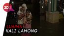 Potret Warga Gresik Salat Tarawih di Tengah Banjir Potret Warga Gresik Salat Tarawih di Tengah Banjir