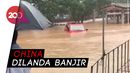 Ribuan Orang di China Terpaksa Mengungsi Akibat Banjir Ribuan Orang di China Terpaksa Mengungsi Akibat Banjir