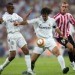 Madrid Menang, Woodgate Diusir