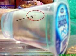 Aqua Gelas Sedikit Tercemar