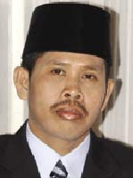 Putu Artha Curi-curi Waktu Nyoblos