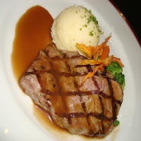 Rib Eye Steak with Green Peppercorn Sauce