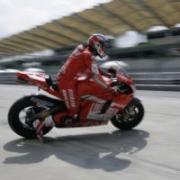 Stoner Kembali Tercepat, Rossi Kedua