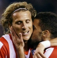 Menang, Atletico Buru Valencia