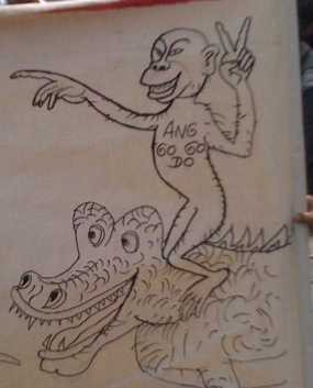 Monyet Anggogodo Menunggang Buaya