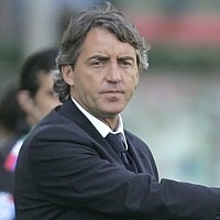 Hughes Dipecat, Mancini Latih City 