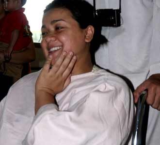 Nirina di Kursi Roda