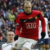 Rooney Bawa MU Pertahankan Gelar