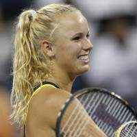 Wozniacki Melaju dengan Mulus