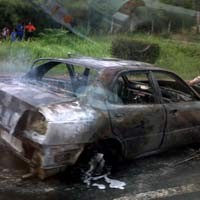 Sedan Baleno Terbakar di Tol Cikampek