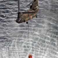 Helikopter & Meriam Air Dikerahkan Untuk Dinginkan Reaktor Fukushima