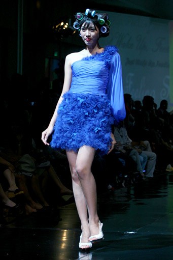 Sutanto Danuwidjaja Just Waked Up, Feeling So Sexy. Jakarta Fashion & Food Festival 2011 at Ballroom Hotel Haris. Kalapa Gading. Jakarta. [Foto: Mohammad Abduh/Wolipop]